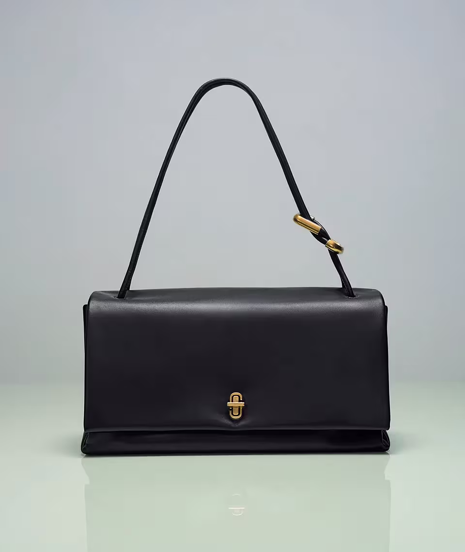 The Leather Medium Tote Bag in White with various charms
