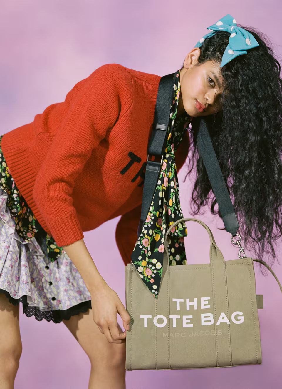 Model holding the Canvas Medium Tote Bag