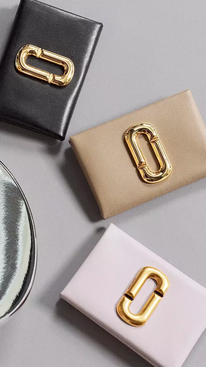 The Scene Snap Card Holder in Black, Light Slate, and Light Iris